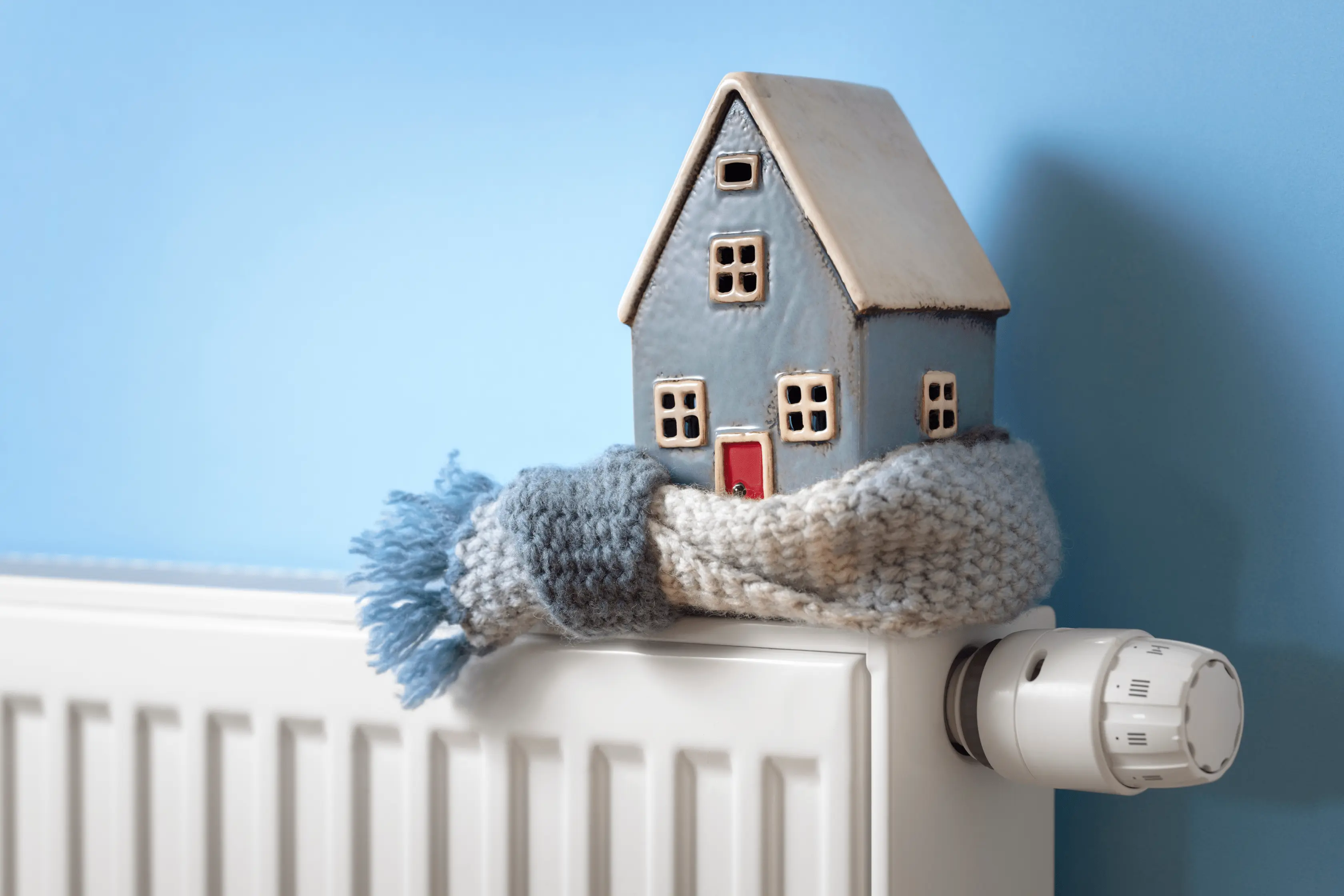 Home Placed On Radiator With Scarf Around It